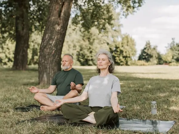 Elderly couple doing breathwork