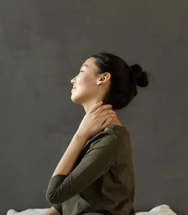 Woman with neck and back pain